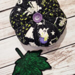 Creepy print fabric pumpkin for Halloween