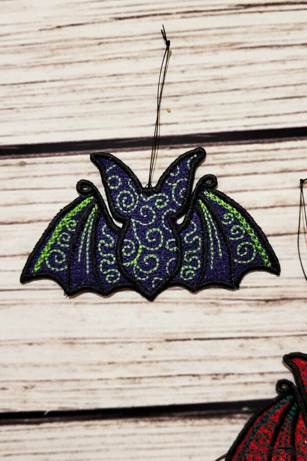 Swirly autumn bat lace hanging gothic halloween decoration.