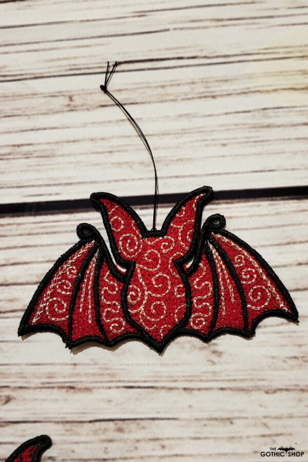 Swirly autumn bat lace hanging gothic halloween decoration.