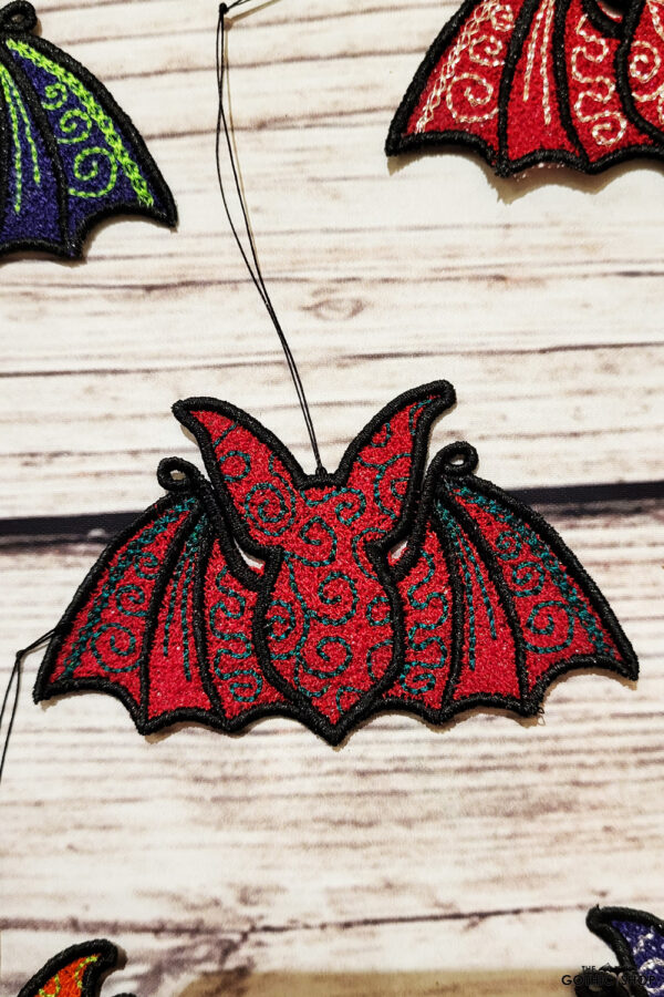 Swirly autumn bat lace hanging gothic halloween decoration.