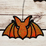 Swirly autumn bat lace hanging gothic halloween decoration.