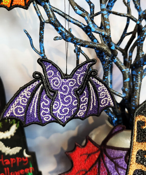 Swirly autumn bat lace hanging gothic halloween decoration.