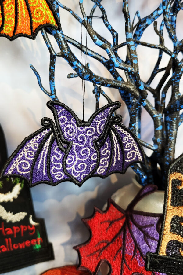 Swirly autumn bat lace hanging gothic halloween decoration.
