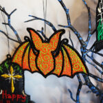 Swirly autumn bat lace hanging gothic halloween decoration.