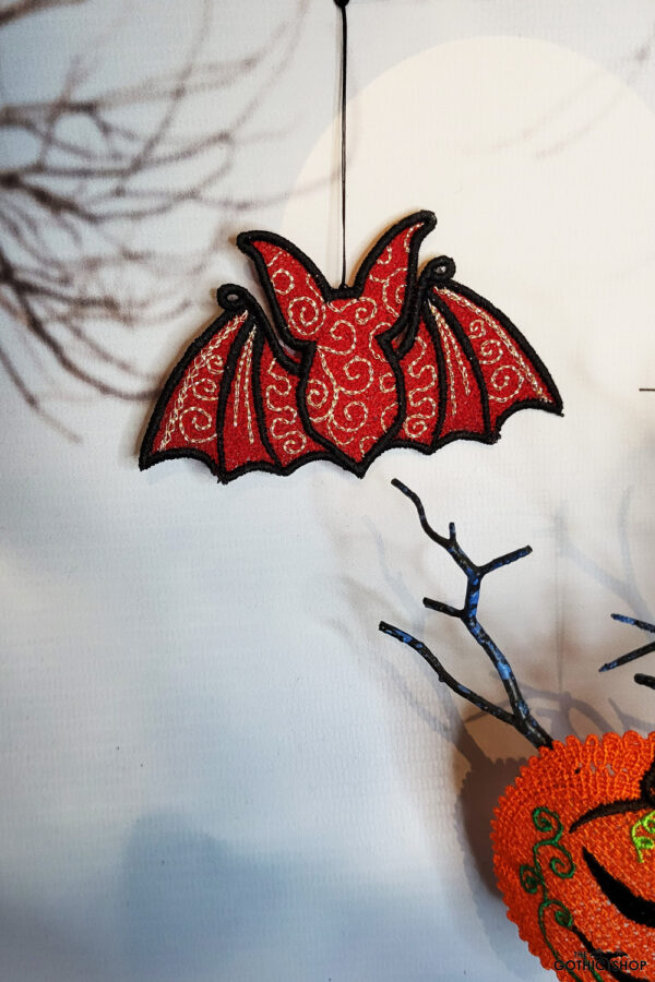 Swirly autumn bat lace hanging gothic halloween decoration.