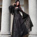 Model Hekate wears the Belladonna Court Black Brocade Gothic Victorian Prom Dress and mourning veil