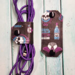 Nevermore Academy Cable Tidy Strap / Earphone Holder / Cord Keeper