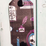 Nevermore Academy Cable Tidy Strap / Earphone Holder / Cord Keeper