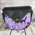 Acacia purple halloween gothic print crossbody bag