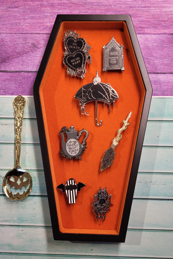 Orange velvet trinket box and gothic enamel pins