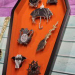 Orange velvet trinket box and gothic enamel pins