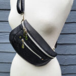 Clamshell Black Floral Vinyl Sling Crossbody Bag with Bats Lining