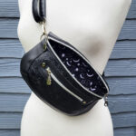 Clamshell Black Floral Vinyl Sling Crossbody Bag with Bats Lining