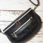 Clamshell Black Floral Vinyl Sling Crossbody Bag with Bats Lining