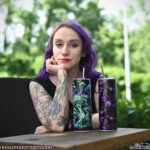 Gothic model VenusMantrap with our trippy mushroom tumbler and bats and cobwebs tumbler.