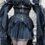 Gothic model Hekate wears the Octavie Off Shoulder Black Gothic Prom Dress, Nathalia Bolero and Black Brocade waspie corset.