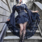 Gothic model Hekate wears the Octavie Off Shoulder Black Gothic Prom Dress, Nathalia Bolero and Black Brocade waspie corset.