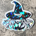 Smiling Young Witch with Moon Hat Black/White Gothic Glossy Sticker