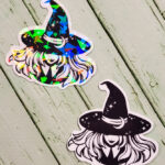 Smiling Young Witch with Moon Hat Black/White Gothic Glossy Sticker
