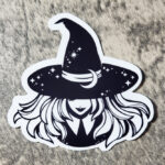 Smiling Young Witch with Moon Hat Black/White Gothic Glossy Sticker