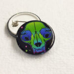Green Cat Skull Blue Eyes Gothic Pin Badge