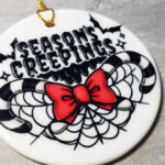 Season's Creepings Round Gothic Hanging Ceramic Decoration