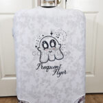 Plush Ghost Frequent Flyer on White Gothic Suitcase Cover