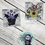 Gothic print coasters including bats and the grim reaper.