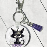 personalised drippy black cat round gothic keyring