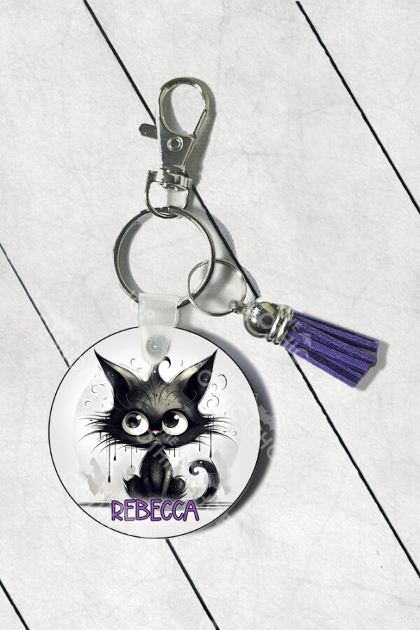 personalised drippy black cat round gothic keyring