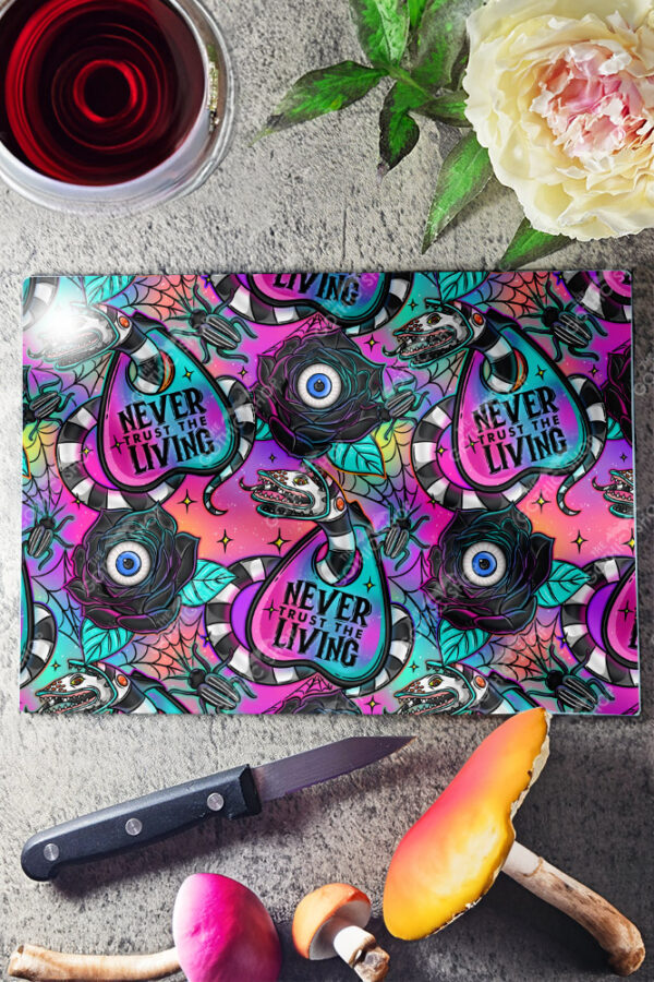 never trust the living sandworm & planchette gothic glass chopping board