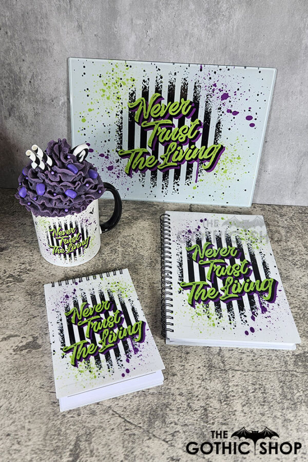 Never Trust The Living Grunge Striped Gothic Halloween Mug, notebooks and chopping board.