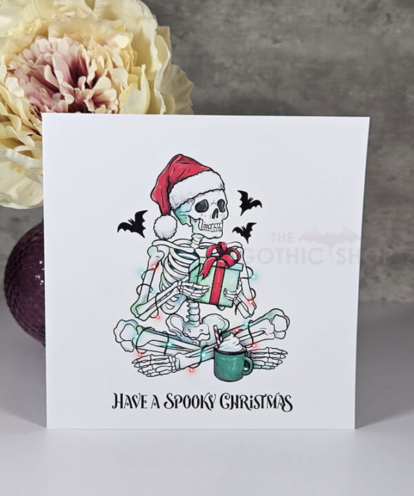 Spooky Skeleton with Gift Gothic Christmas Card