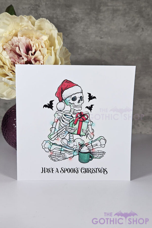 Spooky Skeleton with Gift Gothic Christmas Card