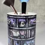 witchy curios rustic grungy grey bookshelves pen or makeup brush pot