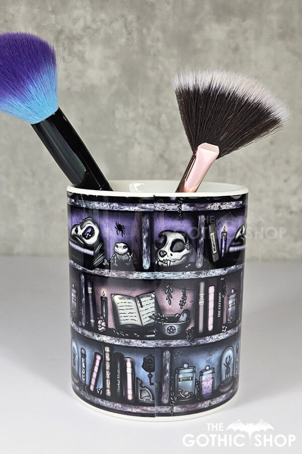 witchy curios rustic grungy grey bookshelves pen or makeup brush pot