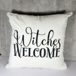 witches welcome white/black velvet cushion