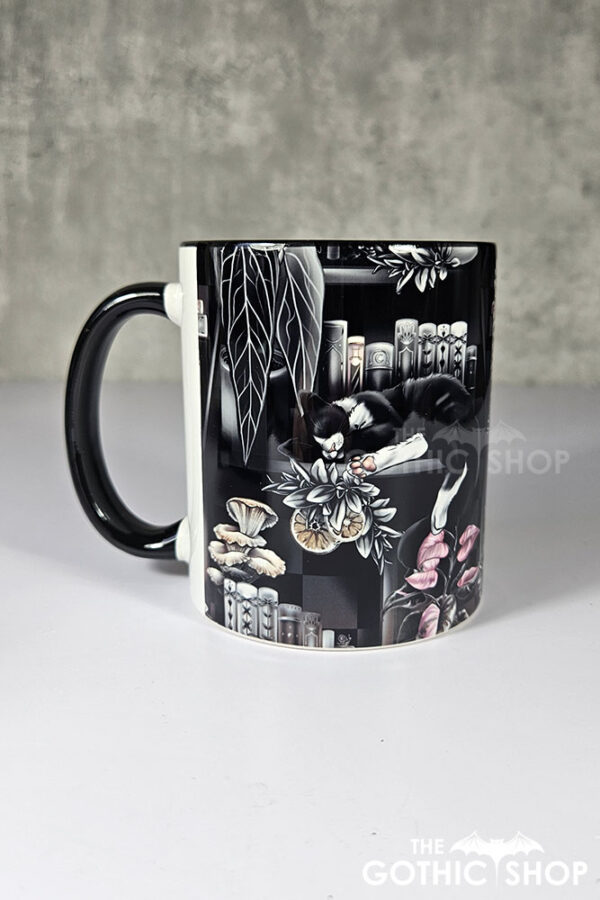 cottagecore bookshelves mushrooms and black/white cat ceramic mug
