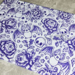 spooky porcelain purple bats & flowers glass chopping board or worktop protector