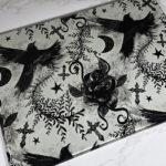 ravens & roses grey gothic glass chopping board