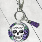 happy skulls & purple flowers round gothic keyring