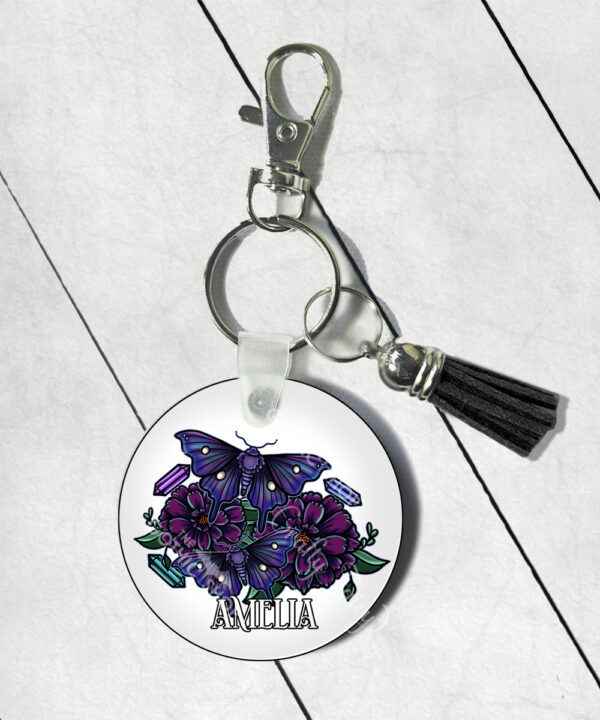 personalised mystical purple moths and crystals round gothic keyring