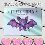 personalised kawaii purple bat gothic glass chopping board or worktop protector gift