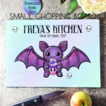 personalised kawaii purple bat gothic glass chopping board or worktop protector gift