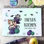 personalised kitschy kitty cats in teacups gothic glass chopping board or worktop protector gift