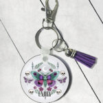 personalised pretty goth moth round gothic keyring