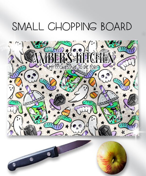 personalised spooky but sweet halloween glass chopping board or worktop protector gift