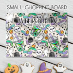 personalised spooky but sweet halloween glass chopping board or worktop protector gift