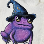 magical kawaii purple witchy frog hot water bottle with plush cover