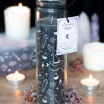 crystal witch jasmine tube candle with amethyst chips